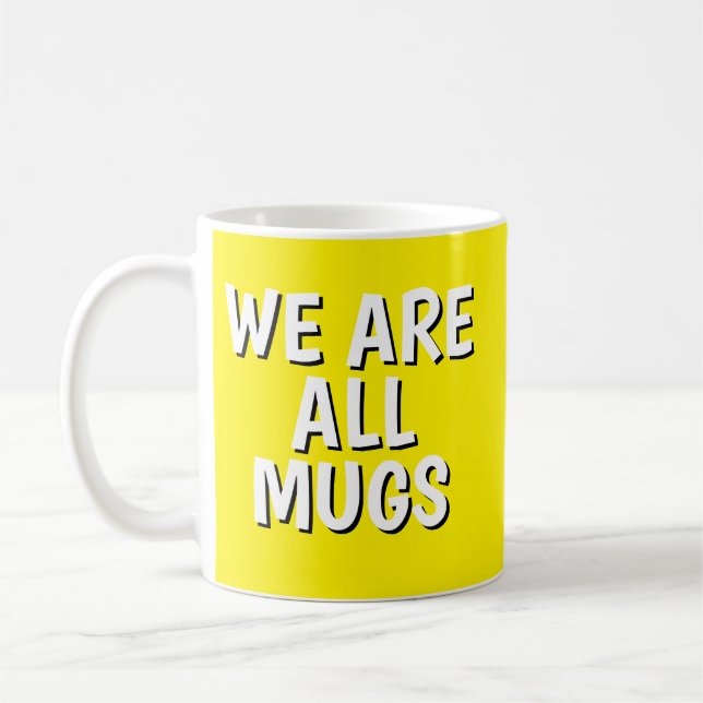 "We Are All Mugs” Mug – Cheeky Ceramic Yellow Kaffeetasse (Links)