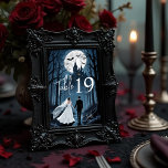 Wedding Couple Spooky Forest Toward Haunted Castle Tischnummer<br><div class="desc">Spooky Forest Wedding Couple Toward Haunted Castle Table Numbers for Double-Digit Tables. This captivating design portrays a newlywed couple walking through a mystical forest on their way to an ancient, haunted castle. Wrapped in soft shadows and ethereal light, the scene combines romance and mystery, evoking the allure of gothic elegance...</div>