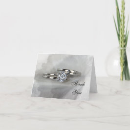 Wedding Rings on Gray Danke