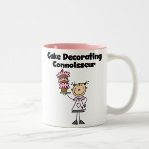 Weibliche Tortenverzierungskennerin Zweifarbige Tasse