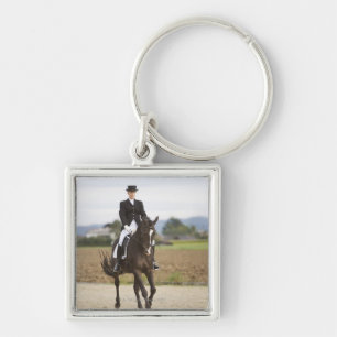 weibliches Dressagereitertrainieren Schlüsselanhänger