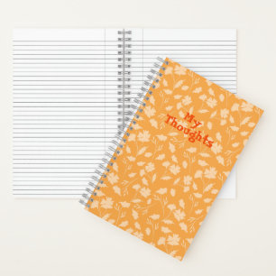 Weiche Blumenmuster auf orangefarbenem Hintergrund Notizbuch