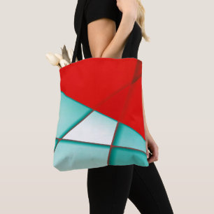 Weiches Rechteck der Turcoise Trapeze unter rotem  Tasche