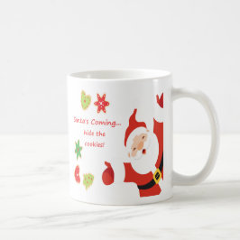 Weihnachten: Der Weihnachtsmann verheimlicht die K Kaffeetasse