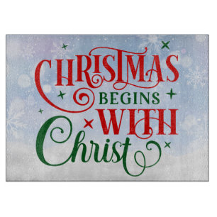 Weihnachten fängt mit Christi-Schneidebrett an Schneidebrett