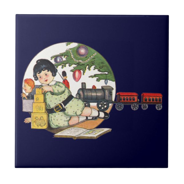 Weihnachten, glücklicher Junge spielen mit Spielze Fliese (Vorderseite)