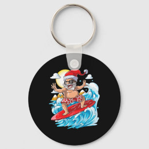 Weihnachten im Juli Santa Hawaiianisches Surfen So Schlüsselanhänger