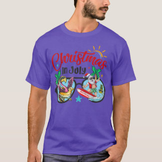 Weihnachten im Juli Strand Flamingo Santa Surfing T-Shirt