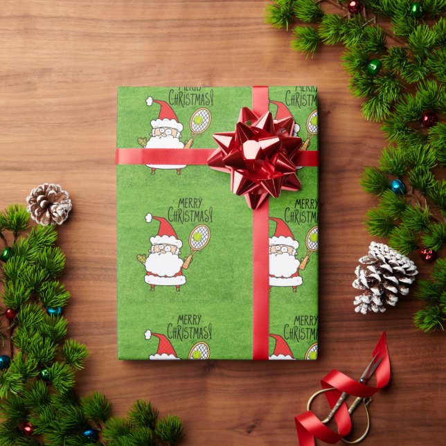 Weihnachten im Tennis mit dem Weihnachtsmann beim  Geschenkpapier (Feiertagsgeschenk)