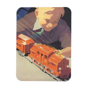 Weihnachten, Junge spielen mit Spielzeugbahnen Magnet