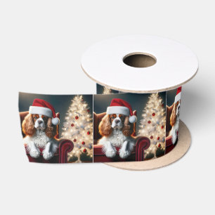 Weihnachten König Charles Spaniel auf einem roten  Satinband