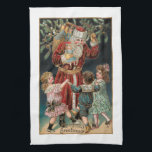 Weihnachten mit Tanz Kinder & Mistletoe Geschirrtuch<br><div class="desc">Jolly rot-robed Vintager Weihnachtsmann hält seinen Sack von Geschenken und heilig mit drei glücklichen Kindern tanzen um ihn herum mit mistletoe Overhead und goldenen Highlights. Die Hintergrundfarbe ist anpassbar.</div>