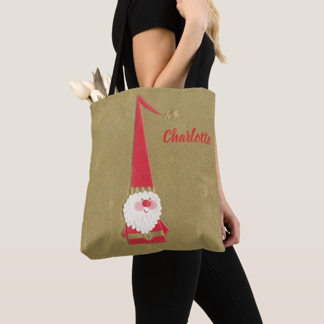 Weihnachten, Niedlicher Weihnachtsmann auf Gold Tasche (Von Nahem)