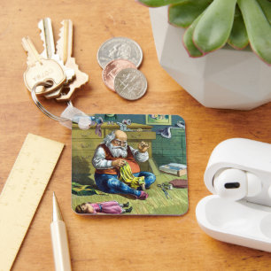 Weihnachten, Weihnachtsmann Spielzeugpuppen machen Schlüsselanhänger