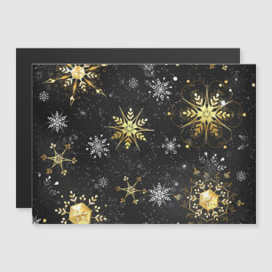 Weihnachtliche goldene Schneeflocken auf schwarzem Magneteinladung
