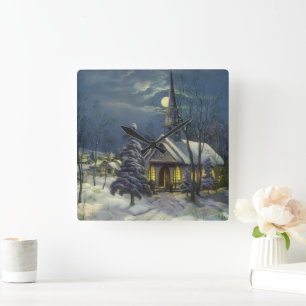 Weihnachtliche Kirche im Schnee mit Mond Quadratische Wanduhr