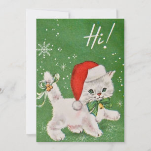 Weihnachtliche weiße Katze im Weihnachtsmannhut im Feiertagskarte
