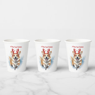 Weihnachts-Corgi mit Rentier-Antlers springen Pappbecher