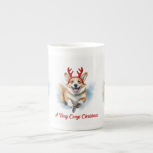 Weihnachts-Corgi mit Rentier-Antlers springen Prozellantasse