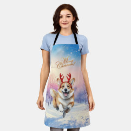 Weihnachts-Corgi-Rentierfischer springen im Schnee Schürze