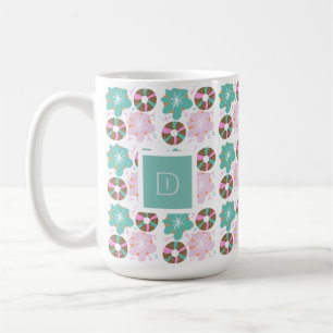 Weihnachts-Donuts mit Frosting und rosa Doodles In Kaffeetasse
