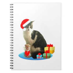 Weihnachts-Dreckspatzkatze und niedlicher kleiner  Notizblock