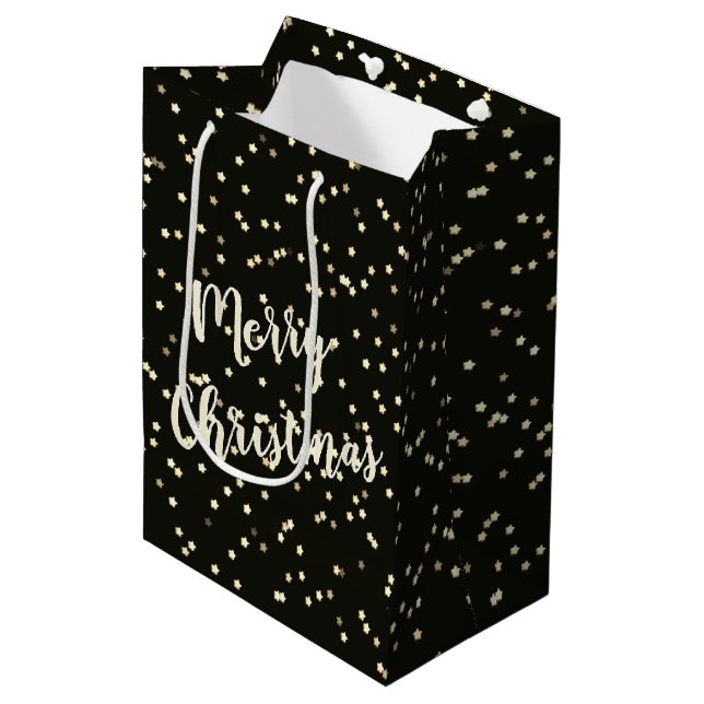Weihnachts-Gold-Stars auf schwarz Mittlere Geschenktüte (Vorderseite Schrägansicht)