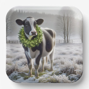 Weihnachts-Holstein-Kuh mit einem Kranz Pappteller