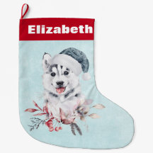 Weihnachts-Husky-Hund in einer Weihnachtsmannmütze