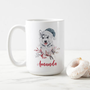 Weihnachts-Husky-Hund in einer Weihnachtsmannmütze Kaffeetasse