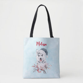 Weihnachts-Husky-Hund in einer Weihnachtsmannmütze Tasche