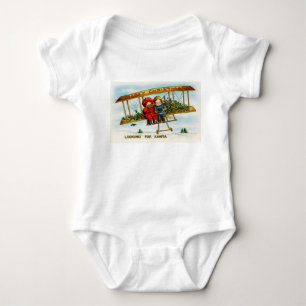 Weihnachts-Kinder auf der Suche nach dem Weihnacht Baby Strampler