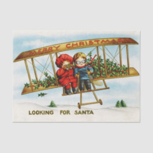 Weihnachts-Kinder auf der Suche nach dem Weihnacht Seidenpapier