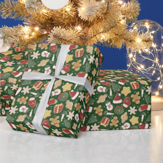 Weihnachts-Lebkuchenmuster auf dunkelgrün Geschenkpapier (Feiertage)