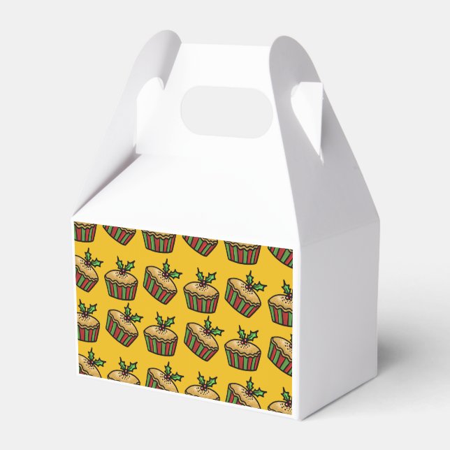Weihnachts-Mini-Kuchen auf einem goldgelben Hinter Geschenkschachtel (Vorderseite)