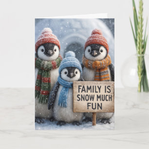 Weihnachts-Penguin-Familie in Schneeflocken Karte