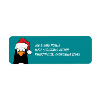 Weihnachts-Pinguin in einer Weihnachtsmannmütze