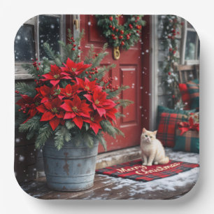 Weihnachts-Poinsettias und weiße Katze vor der Hau Pappteller