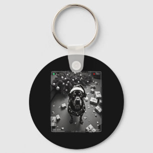 Weihnachts-Rottweiler auf Kamera erwischt Schlüsselanhänger