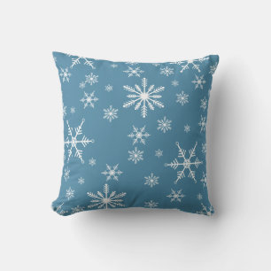 Weihnachts-Schneeflocke auf blau Kissen