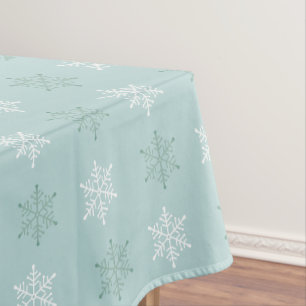 Weihnachts-Schneeflocken auf geheimnisvollem Hellb Tischdecke