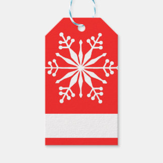 Weihnachts-Schneeflockenmuster. Geschenkanhänger