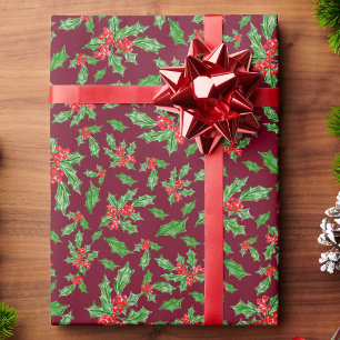 Weihnachts-Stechpalmenblätter und -Beeren rot und Geschenkpapier