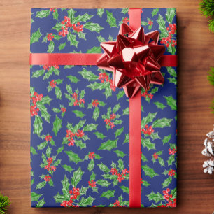 Weihnachts-Stechpalmenblätter und -Beeren rot und Geschenkpapier