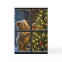 Weihnachts-Teddybär schmückt einen Baum