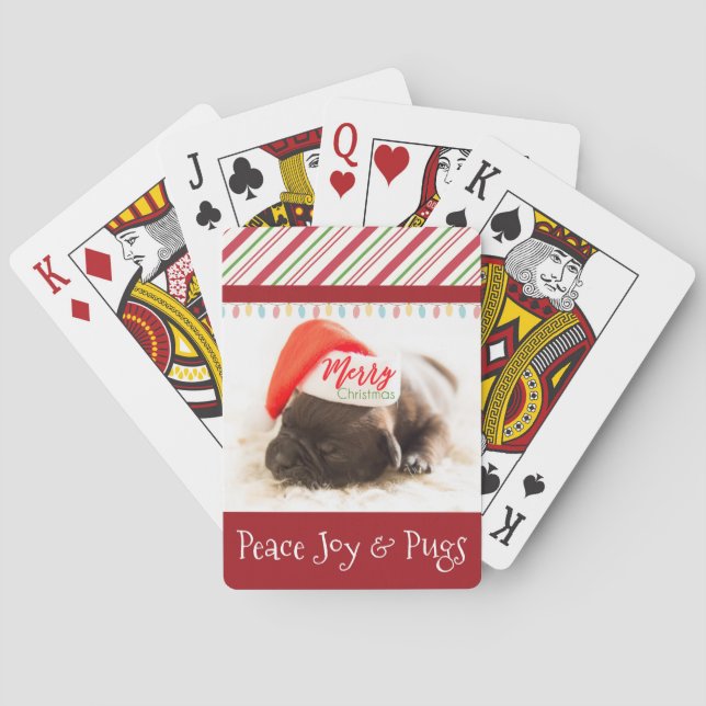 Weihnachts-Welpe in Weihnachtsmannmütze mit festli Spielkarten (Rückseite)