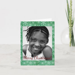 Weihnachts-Winterschnee Fallendes grünes Foto