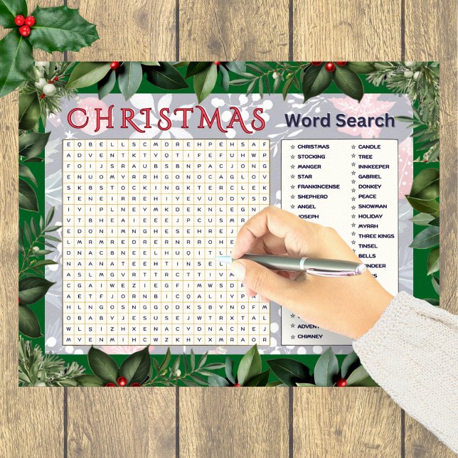Weihnachts-Word-Suche Puzzle festliche Aktivität Poster (A festive Christmas word search poster with greenery border)