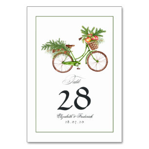 Weihnachtsäpfel und Kiefern Fahrrad Winterhochzeit Tischnummer