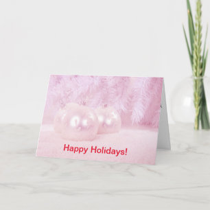 Weihnachtsbälle im Schnee und Rosa Hintergrund Feiertagskarte
